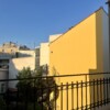Yellow wall in Athens, Greece